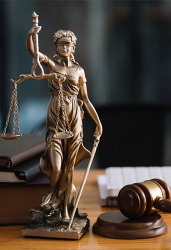statue-of-lady-justice-on-desk-of-a-judge-or-lawye-SVECXT5-intro.jpg